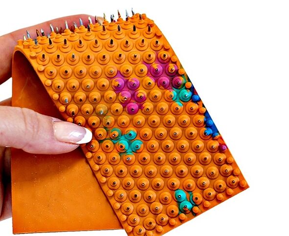 aplikator za akupunkturo pri cervikalni osteohondrozi