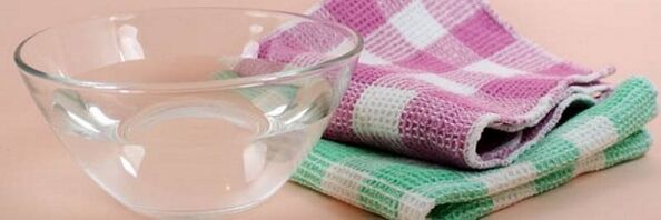 navlaženo brisačo za stiskanje pri cervikalni osteohondrozi